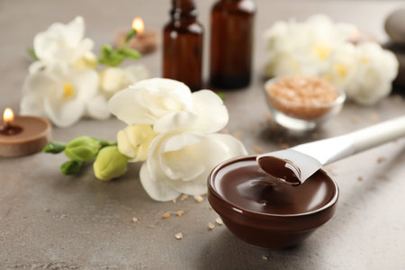 Cosmetic product for spa body wraps on light gray stone backgroundの写真素材