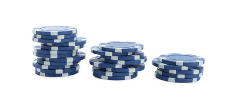 Stacks of casino poker chips on white backgroundの写真素材