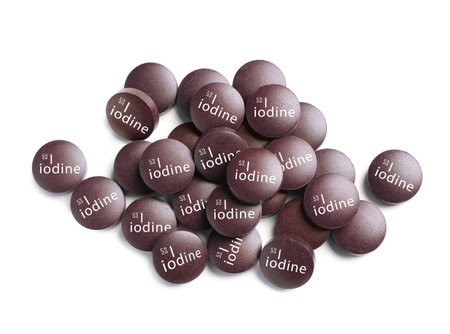 Iodine pills on white background, top view. mineral elementの写真素材