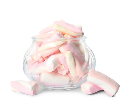 Tasty marshmallows in glass jar on white backgroundの写真素材