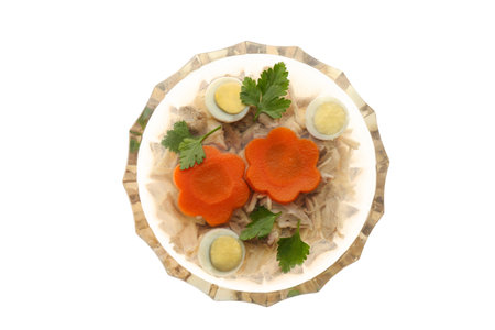 Delicious homemade aspic with meat in bowl isolated on white, top viewの写真素材
