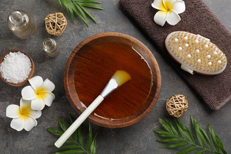 Flat lay composition with cosmetic product for spa body wraps on grey backgroundの写真素材