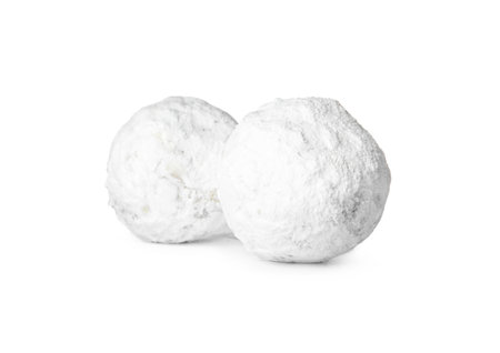 Tasty Christmas snowball cookies on white backgroundの写真素材