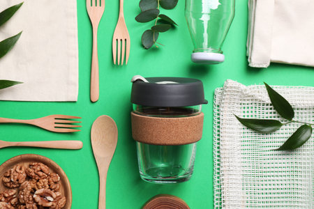 Flat lay composition with eco friendly products on green backgroundの写真素材