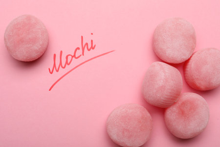 Flat lay composition with delicious mochi on pink background. Traditional Japanese dessertの写真素材