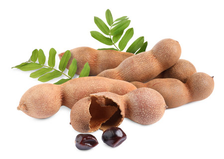 Delicious ripe tamarinds on white background. exotic fruitsの写真素材