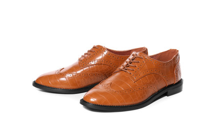Stylish elegant leather shoes isolated on whiteの写真素材