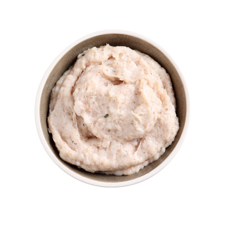Delicious lard spread in bowl isolated on white, top view