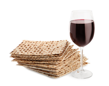 Traditional matzos and red wine on white backgroundの写真素材