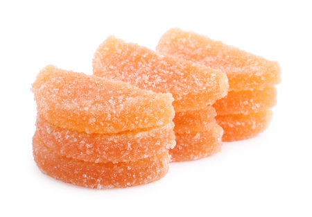 Sweet orange jelly candies on white backgroundの写真素材