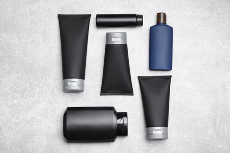 Flat lay composition with set of men's cosmetic products on light gray backgroundの写真素材