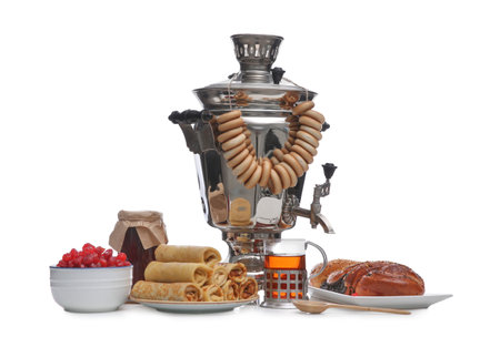 Traditional Russian samovar and treats on white backgroundの写真素材