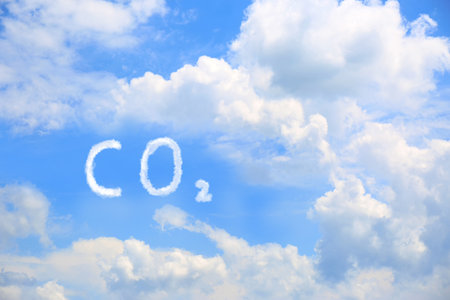 CO2 emissions. View of blue sky with white cloudsの写真素材