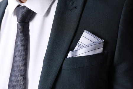 Man with handkerchief in suit pocket, closeupの写真素材