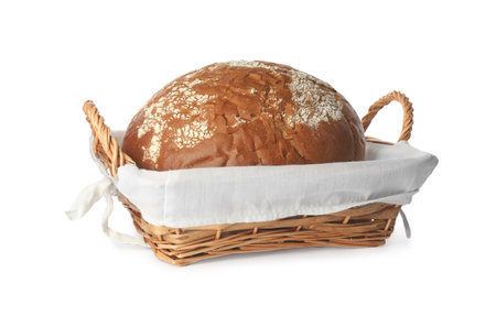 Fresh rye bread in basket on white backgroundの写真素材