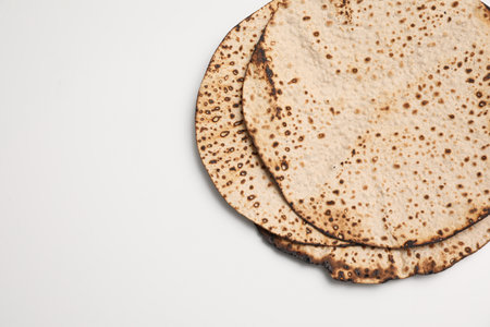 Tasty matzos on white background, top view. Passover (Pesach) celebrationの写真素材