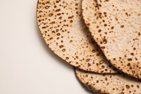 Tasty matzos on white background, top view. Passover (Pesach) celebrationの写真素材