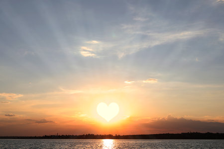 picturesque view of beautiful sunset on riversideの写真素材