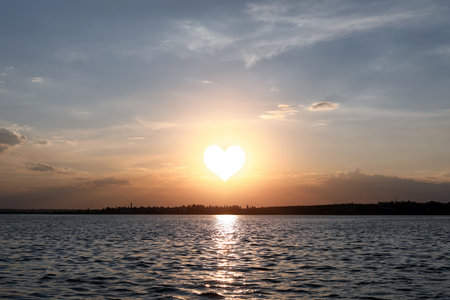 picturesque view of beautiful sunset on riversideの写真素材