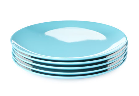 Empty clean ceramic dishware isolated on whiteの写真素材