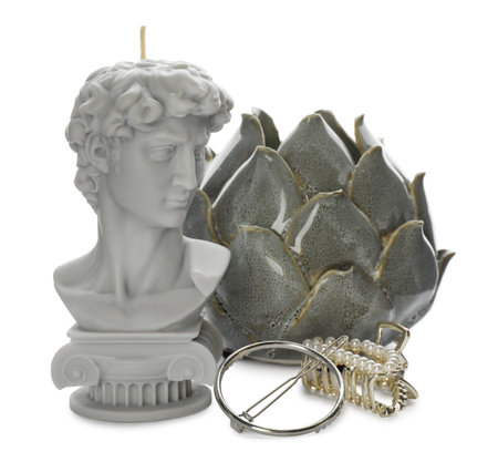 Beautiful David bust candle and accessories on white backgroundの写真素材