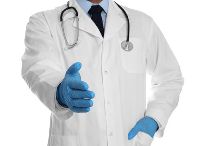 Doctor in gloves offering handshake on white background, closeupの写真素材