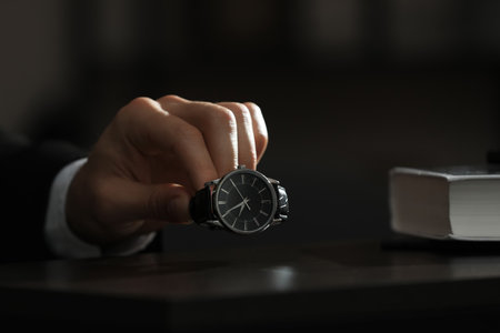Man luxury wrist watch on table, putting closeup. Space for textの写真素材