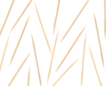 Wooden toothpicks falling on white background, collageの写真素材