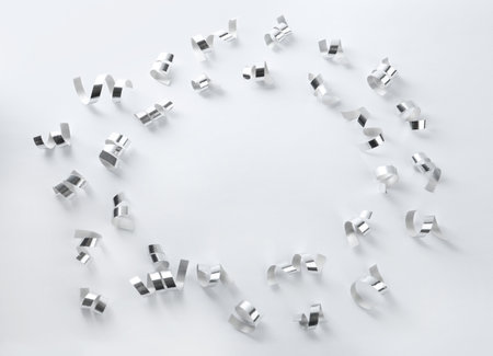 Frame of shiny serpentine streamers on white background, top viewの写真素材