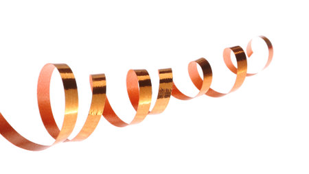 Shiny serpentine streamer on white background. Festive decorの写真素材