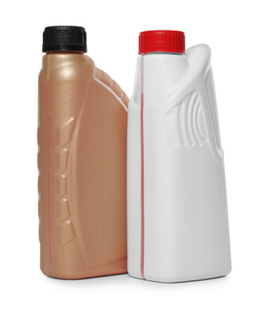 Antifreeze in plastic bottles isolated on whiteの写真素材