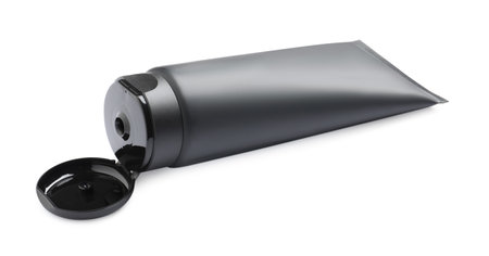 Open tube of men's facial cream isolated on whiteの写真素材