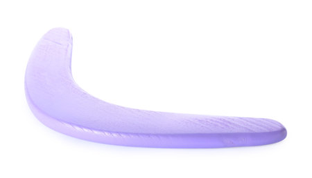 Purple boomerang isolated on white. outdoor activityの写真素材