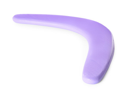 Purple boomerang isolated on white. outdoor activityの写真素材