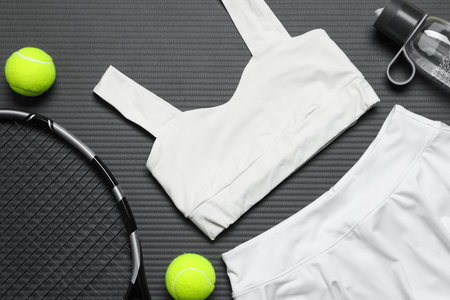 Flat lay composition with sports equipment on gray matの写真素材