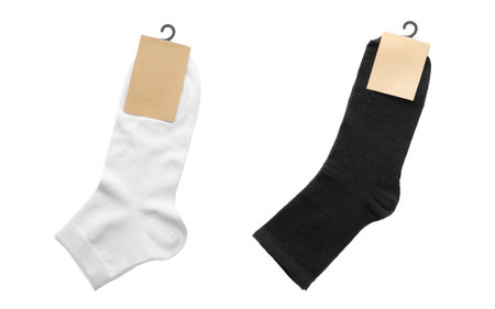 Pairs of cotton socks with blank labels on white background, collageの写真素材
