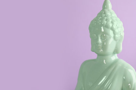 Beautiful ceramic Buddha sculpture on violet background. Space for textの写真素材