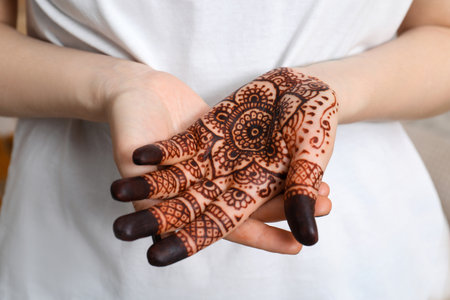 Woman with henna tattoo on palm, closeup. traditional mehndi ornamentの写真素材