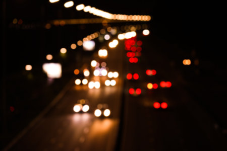Blurred view of road with cars, bokeh effect. night lifeの写真素材