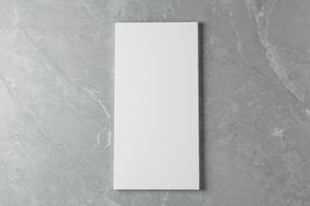 Blank canvas on gray marble table, top view. Space for textの写真素材