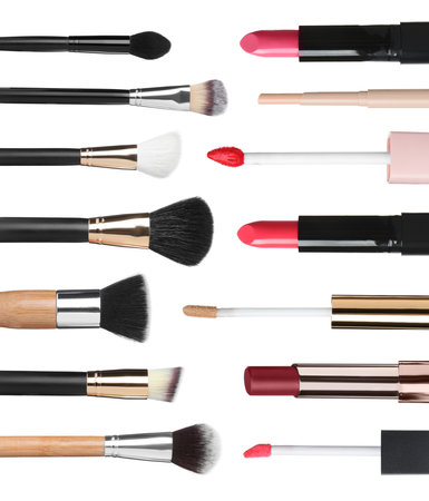 Set with different decorative cosmetics and brushes on white backgroundの写真素材