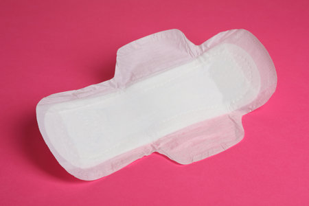 Sanitary napkin on pink background. Gynecology conceptの写真素材