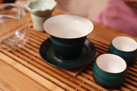 Dishware for traditional tea ceremony on wooden table