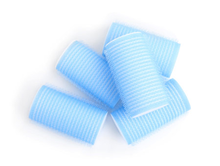 Hair curlers isolated on white, top view. Styling toolの写真素材