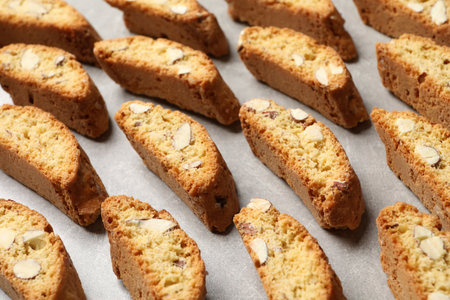 Traditional Italian almond biscuits (Cantucci) on light table, closeupの写真素材
