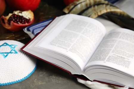 Composition with Rosh Hashanah holiday symbols on gray table, closeupの写真素材