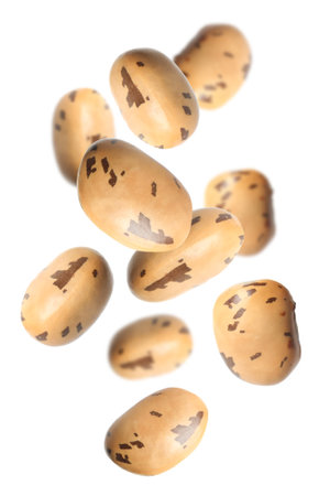 Many beans falling on white background. Vegan dietの写真素材
