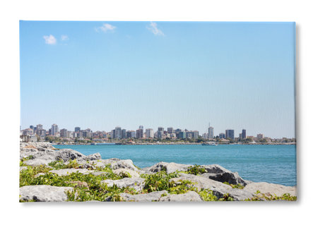 Photo printed on canvas, white background. Beautiful view of the city near the sea on a sunny dayの写真素材