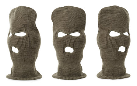 Set with knitted balaclavas on white backgroundの写真素材