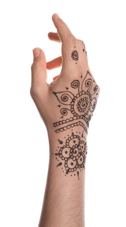 Woman with beautiful henna tattoo on hand against white background, closeup. traditional mehndiの写真素材